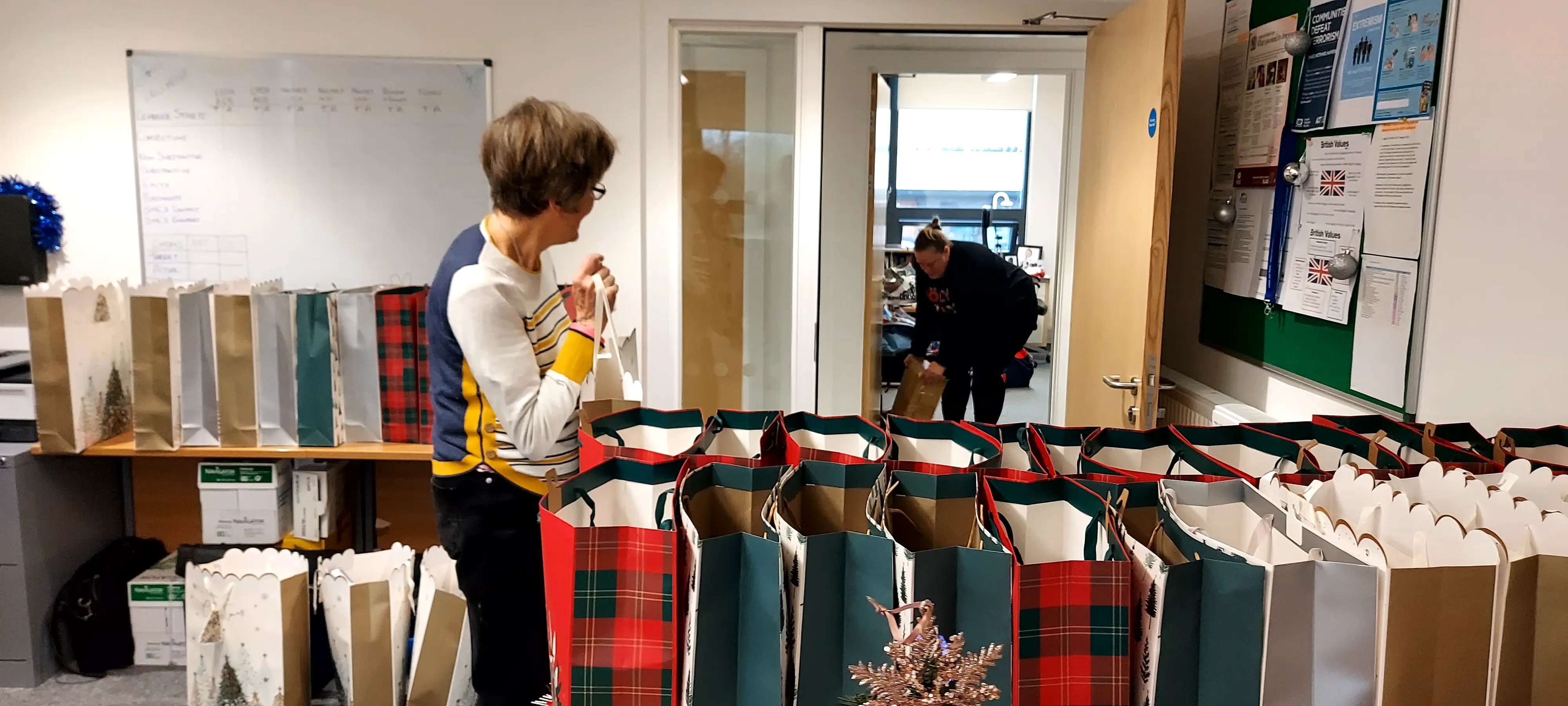 Christmas gift bags being prepared