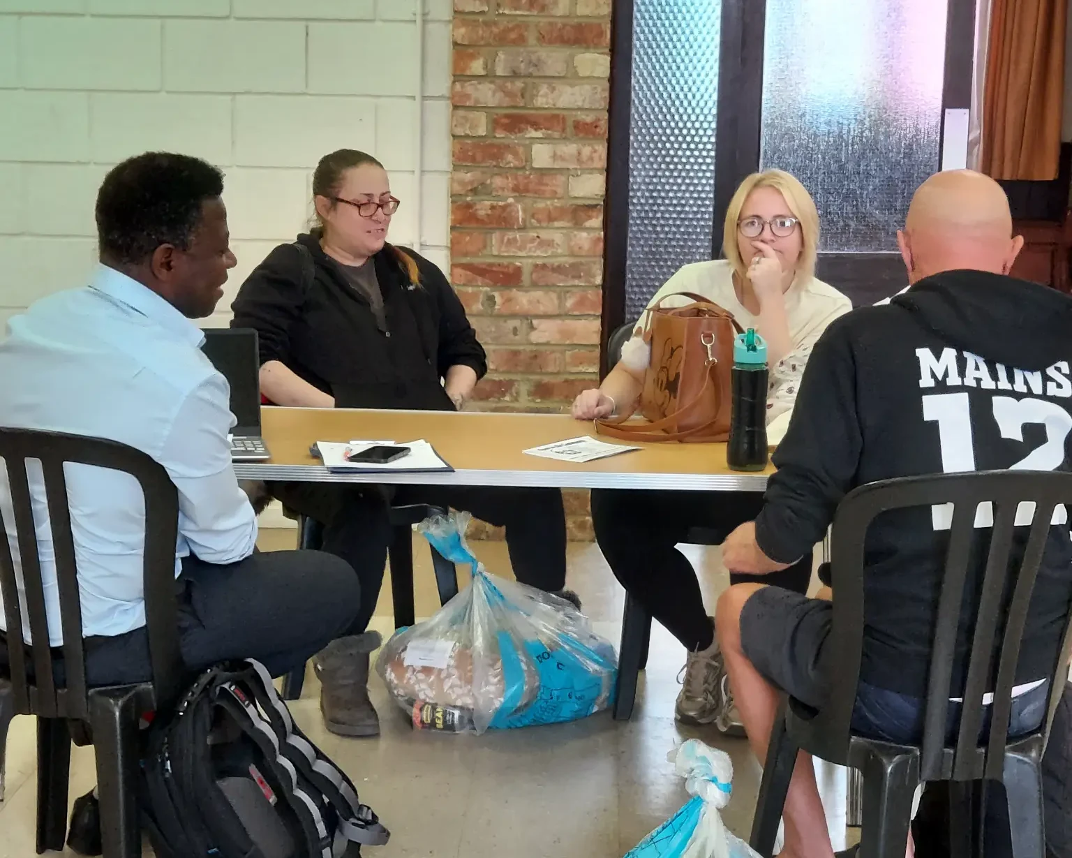 Community service meeting supporting evidence-based project evaluation